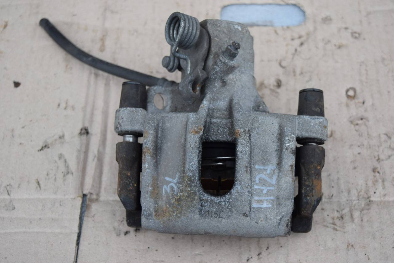 суппорт задний левый Volvo C30 1 поколение 2007, 2.5 л., Ti, бензин, МКПП, серый, хетчбэк 3 дв., передний привод - фото №1