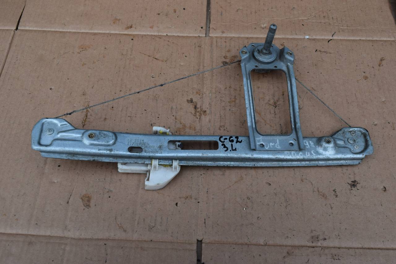 стеклоподъемник задний левый Ford Focus 1 поколение 1999, 1.4 л., бензин - фото №1