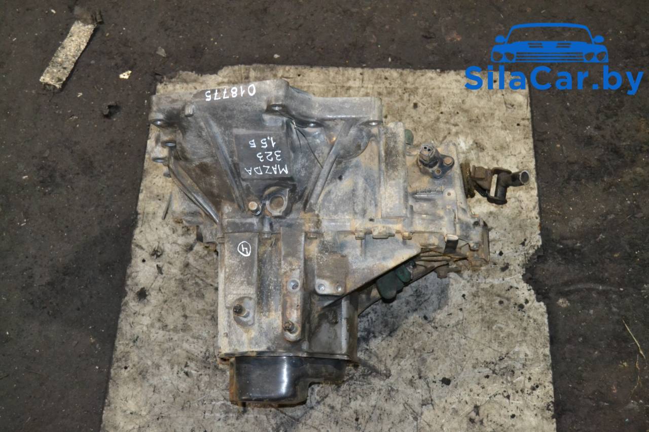 КПП механическая (МКПП) Mazda 323 5 поколение 1996, 1.5 л., бензин, МКПП - фото №1