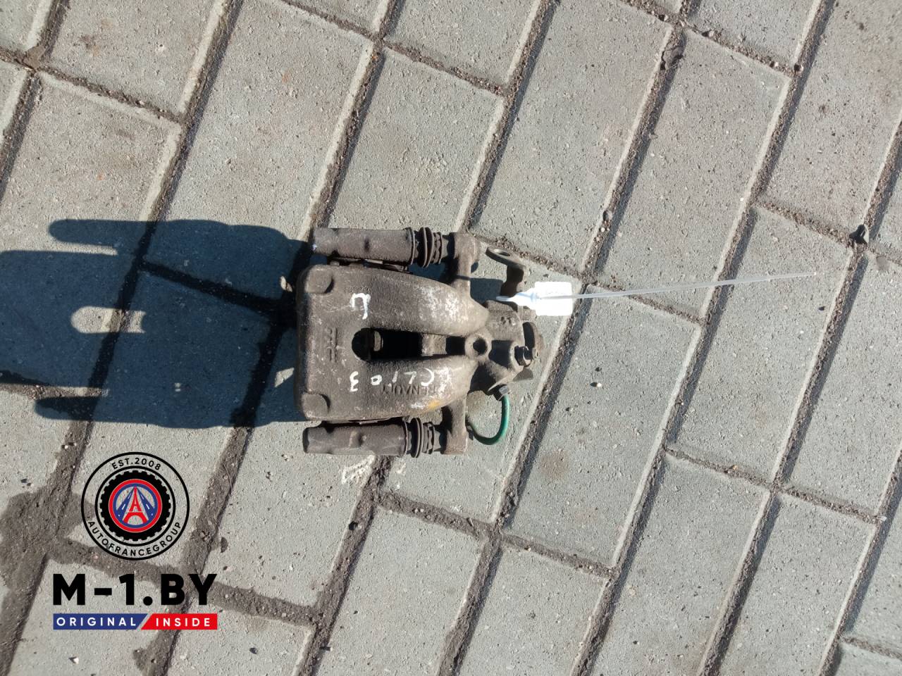 суппорт задний левый Renault Clio 3 поколение (2005 - 2009) - фото №1