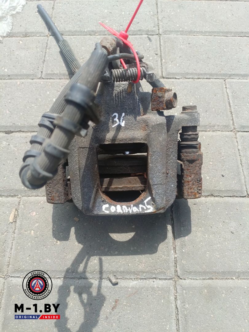 суппорт задний левый Chrysler Voyager 5 поколение (2007 - 2011) - фото №1