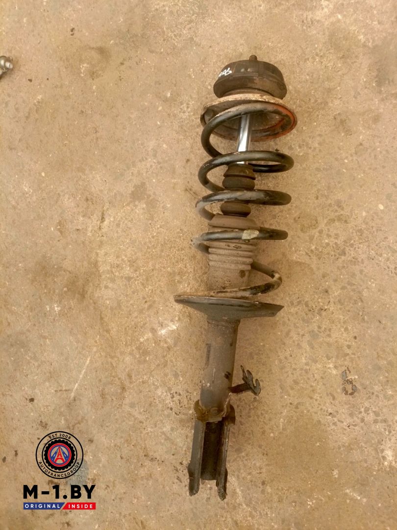 стойка передняя левая Renault Sandero 1 поколение (2009 - 2014), 1.4 л., бензин - фото №1