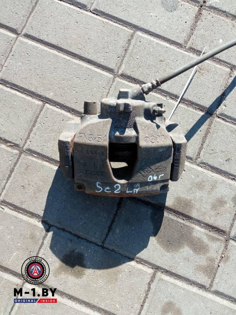 суппорт передний левый Renault Scenic 2 поколение 2006 - фото №1