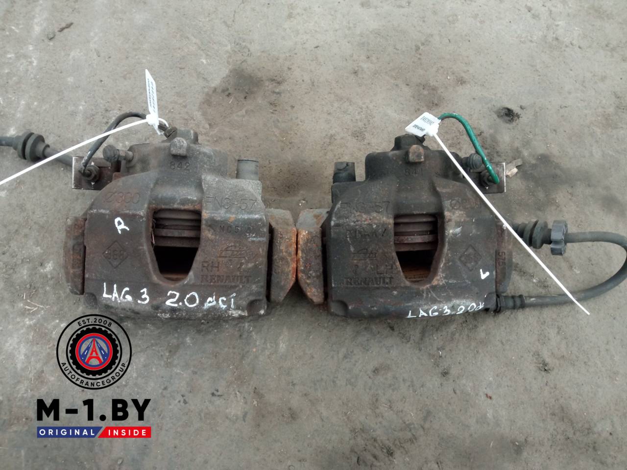 суппорт передний левый Renault Laguna 3 поколение (2007 - 2012), 2.0 л., дизель - фото №1