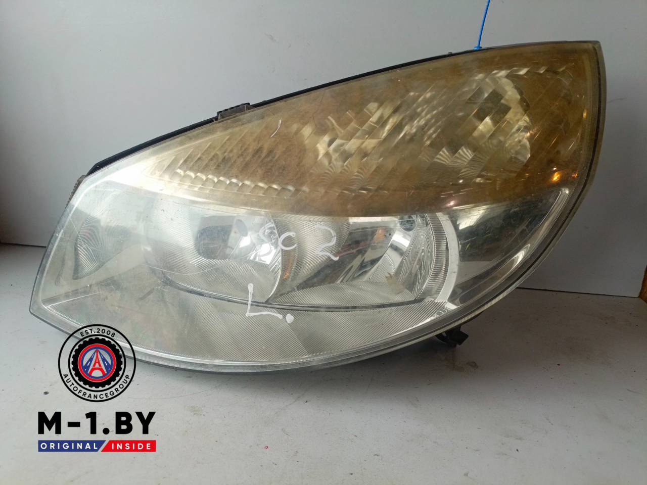 фара левая Renault Scenic 2 поколение (2003 - 2006) - фото №1
