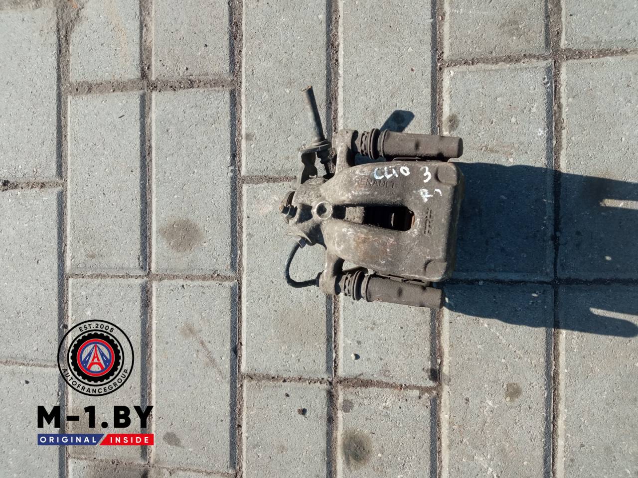 суппорт задний правый Renault Clio 3 поколение (2005 - 2009) - фото №1