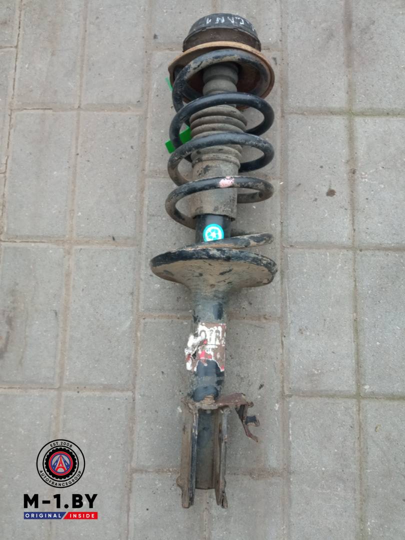 стойка передняя левая Renault Logan 1 поколение (2004 - 2009) - фото №1