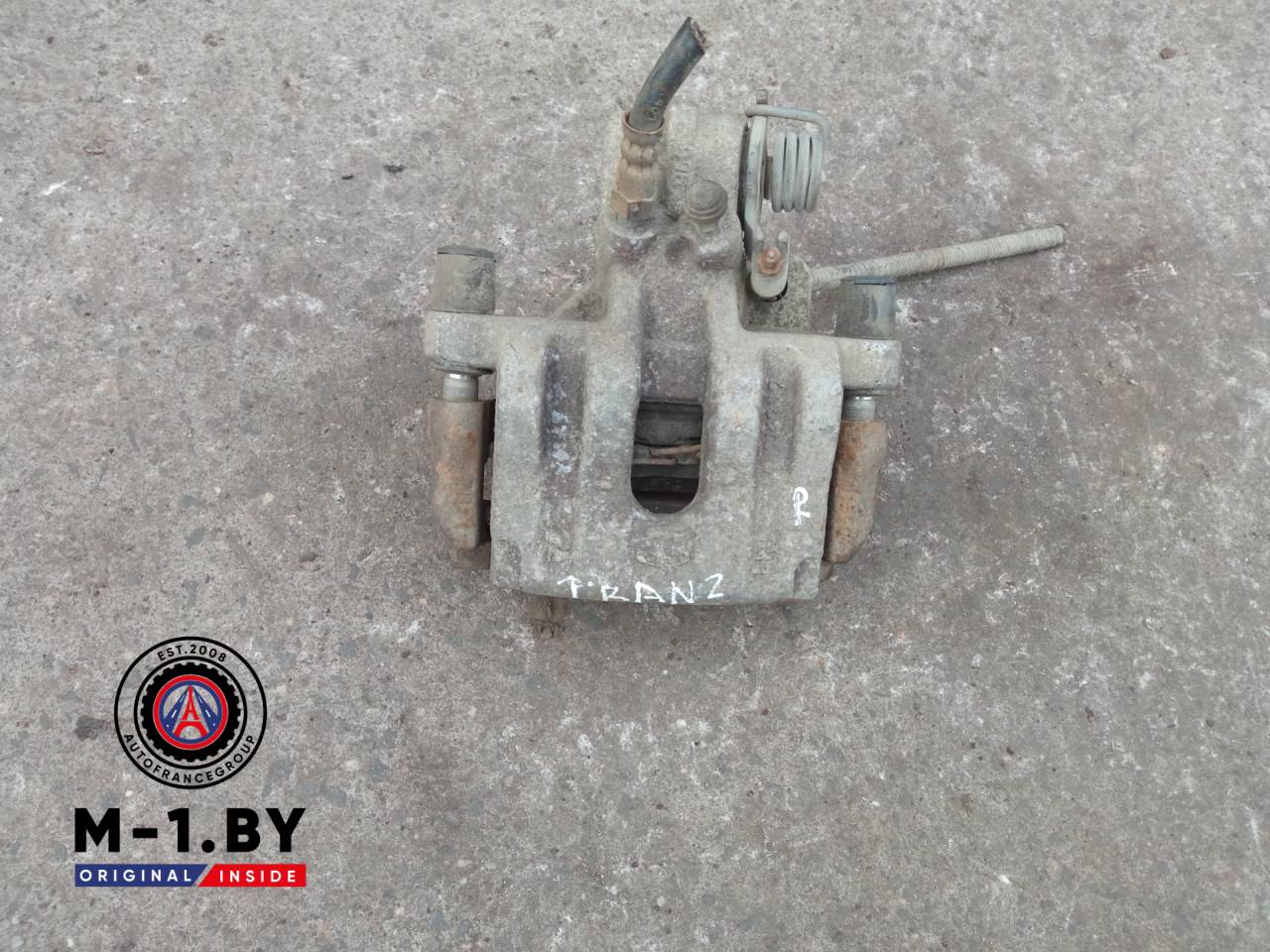 суппорт задний правый Ford Transit Connect 1 поколение (2002 - 2009) - фото №1