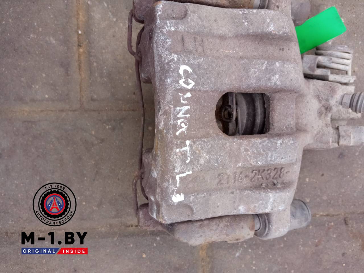 суппорт задний левый Ford Transit Connect 1 поколение (2002 - 2009) - фото №1