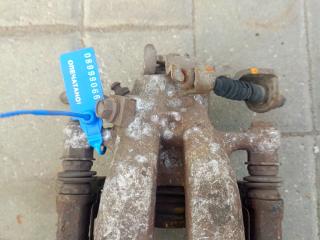 суппорт задний левый Opel Zafira 2 поколение (B) (2005 - 2008)