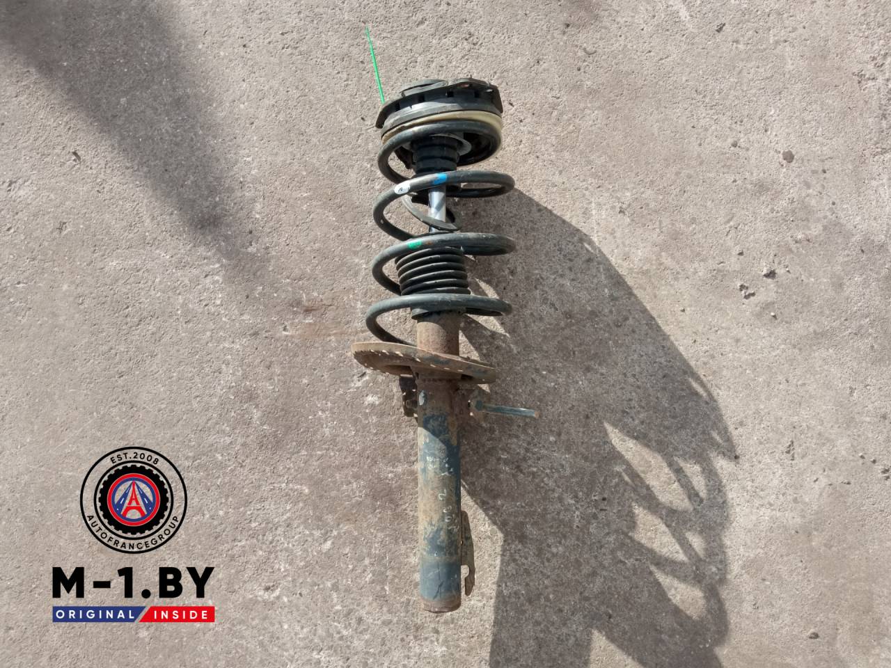 стойка передняя левая Renault Megane 2 поколение (2002 - 2006) - фото №1