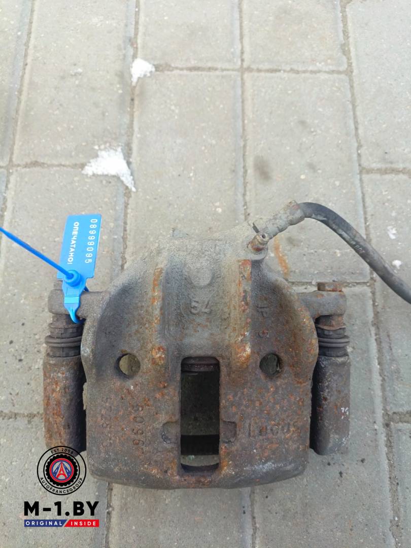 суппорт передний левый Renault Scenic 1 поколение (1996 - 1999), 1.9 л., дизель - фото №1