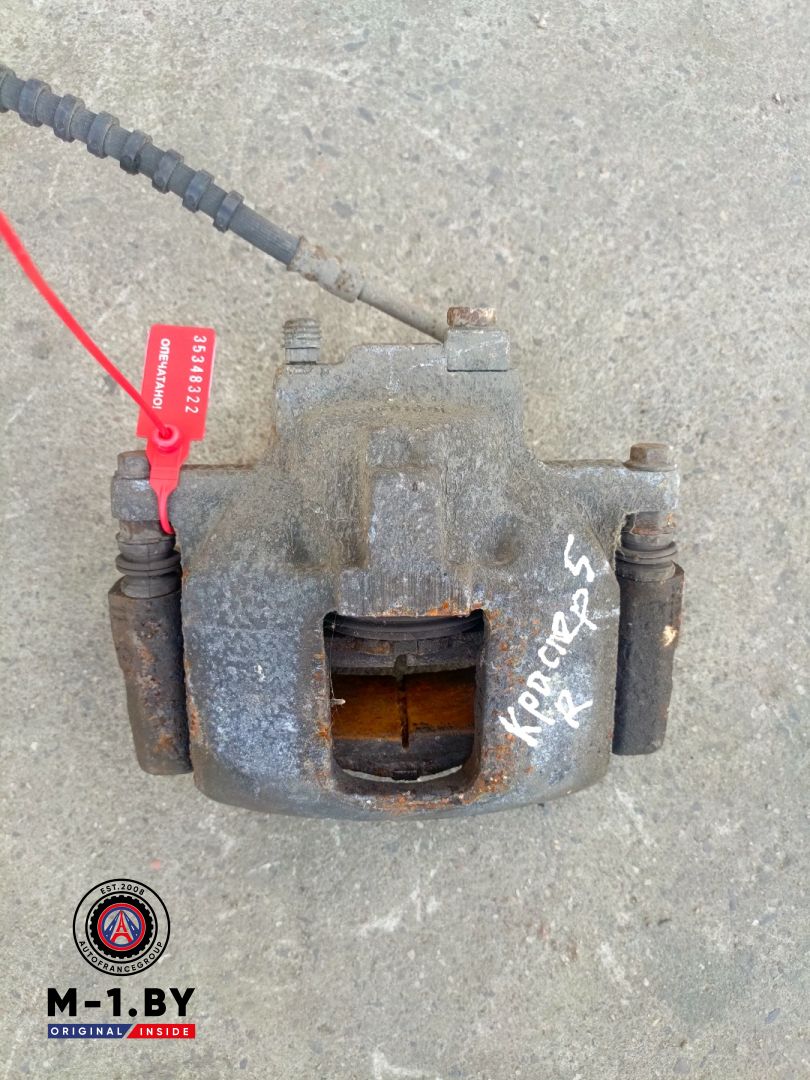 суппорт передний правый Chrysler Voyager 5 поколение (2007 - 2011), 2.8 л., дизель - фото №1