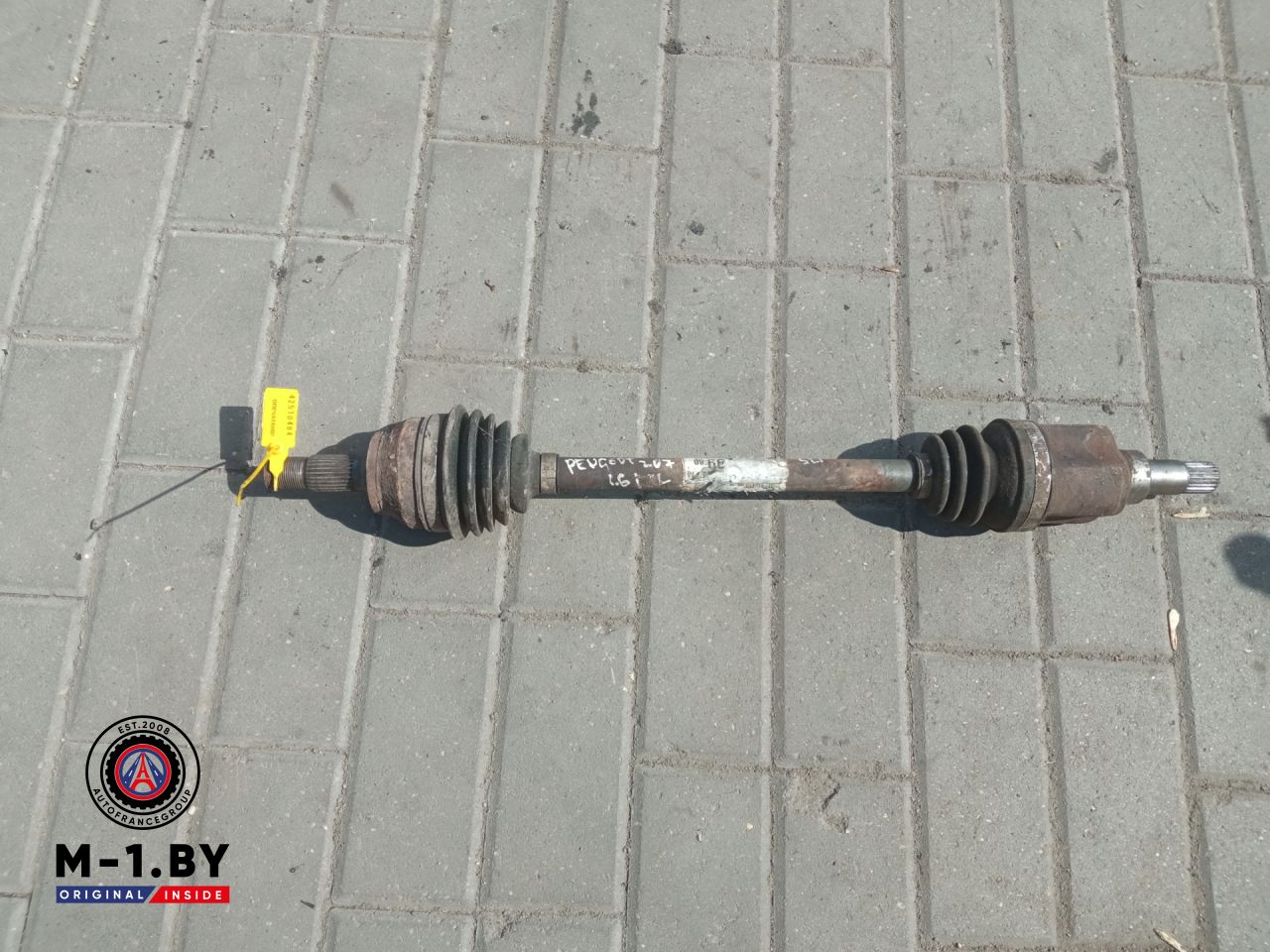 полуось передняя левая (приводной вал, ШРУС) Peugeot 207 1 поколение (2006 - 2009), 1.6 л., бензин - фото №1