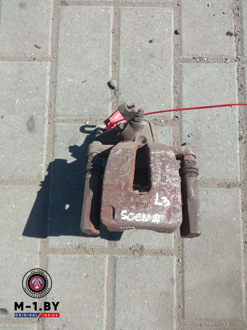 суппорт задний левый Renault Megane 2 поколение (2002 - 2006) - фото №1