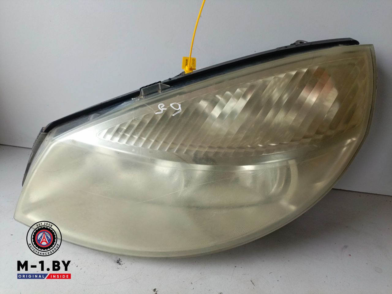 фара левая Renault Scenic 2 поколение (2003 - 2006) - фото №1