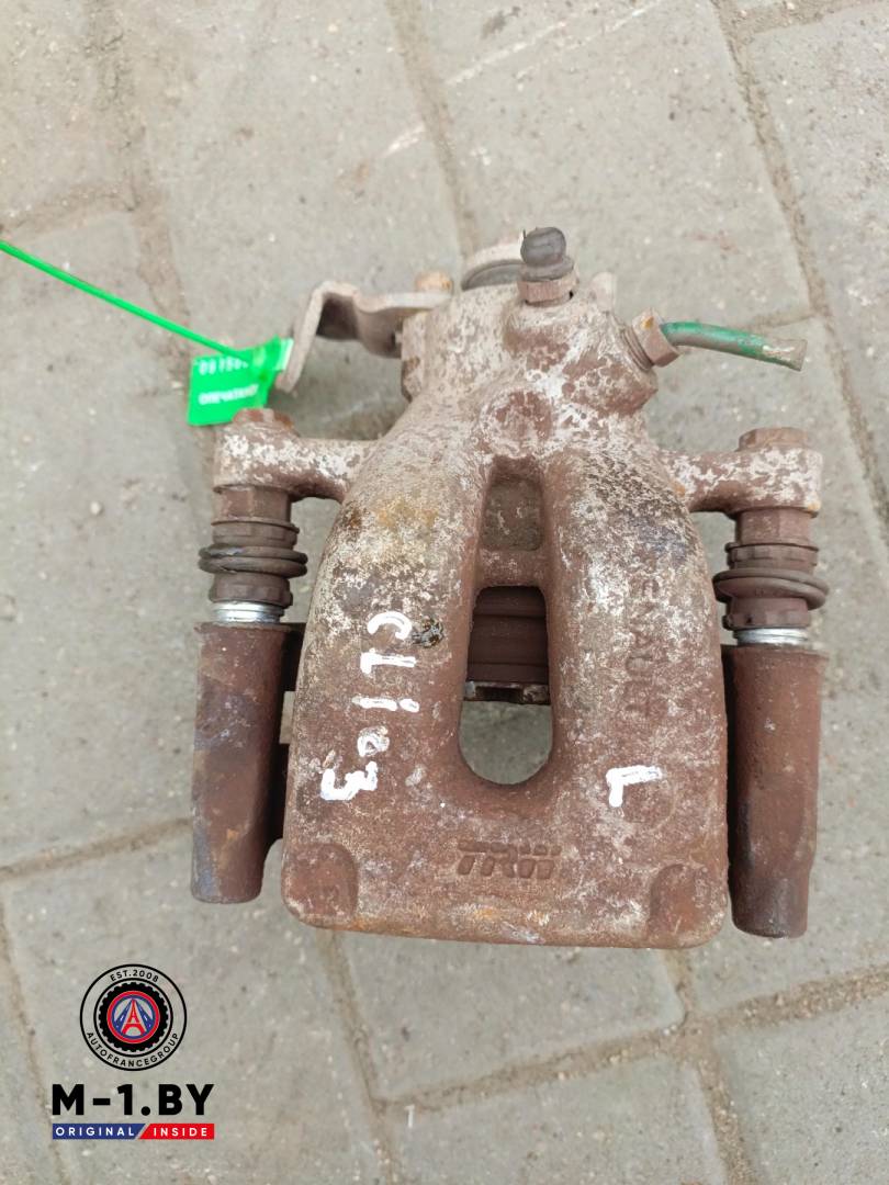 суппорт задний левый Renault Clio 3 поколение (2005 - 2009) - фото №1