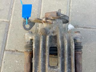 суппорт задний левый Volkswagen Passat B5 (1996 - 2001)