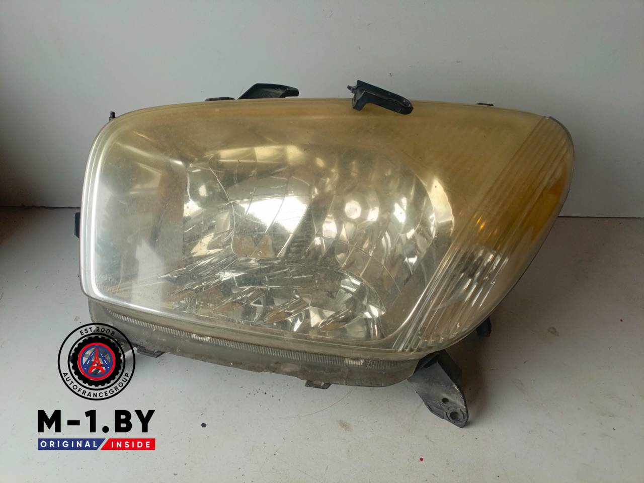 фара левая Toyota RAV4 2 поколение (XA20) (2000 - 2003) - фото №1