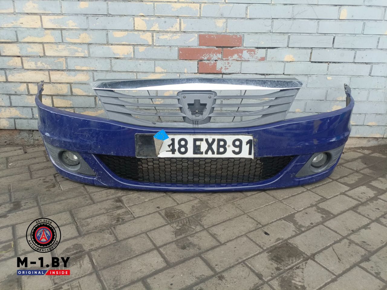 бампер передний Renault Logan 1 поколение (2004 - 2009) - фото №1