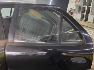 дверь задняя левая Pontiac Sunfire 1 поколение 1999, 2.2 л., бензин, АКПП, черный, передний привод
