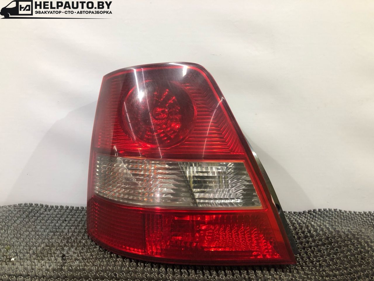 фонарь задний левый Kia Sorento 1 поколение 2005, 2.5 л., дизель, МКПП, серый, полный привод - фото №1