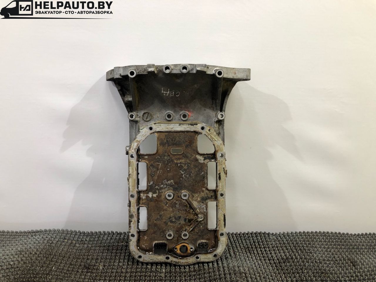 масляный поддон Mazda 626 GE 1994, 1.8 л., FP, бензин, МКПП, бордовый, седан, передний привод - фото №1