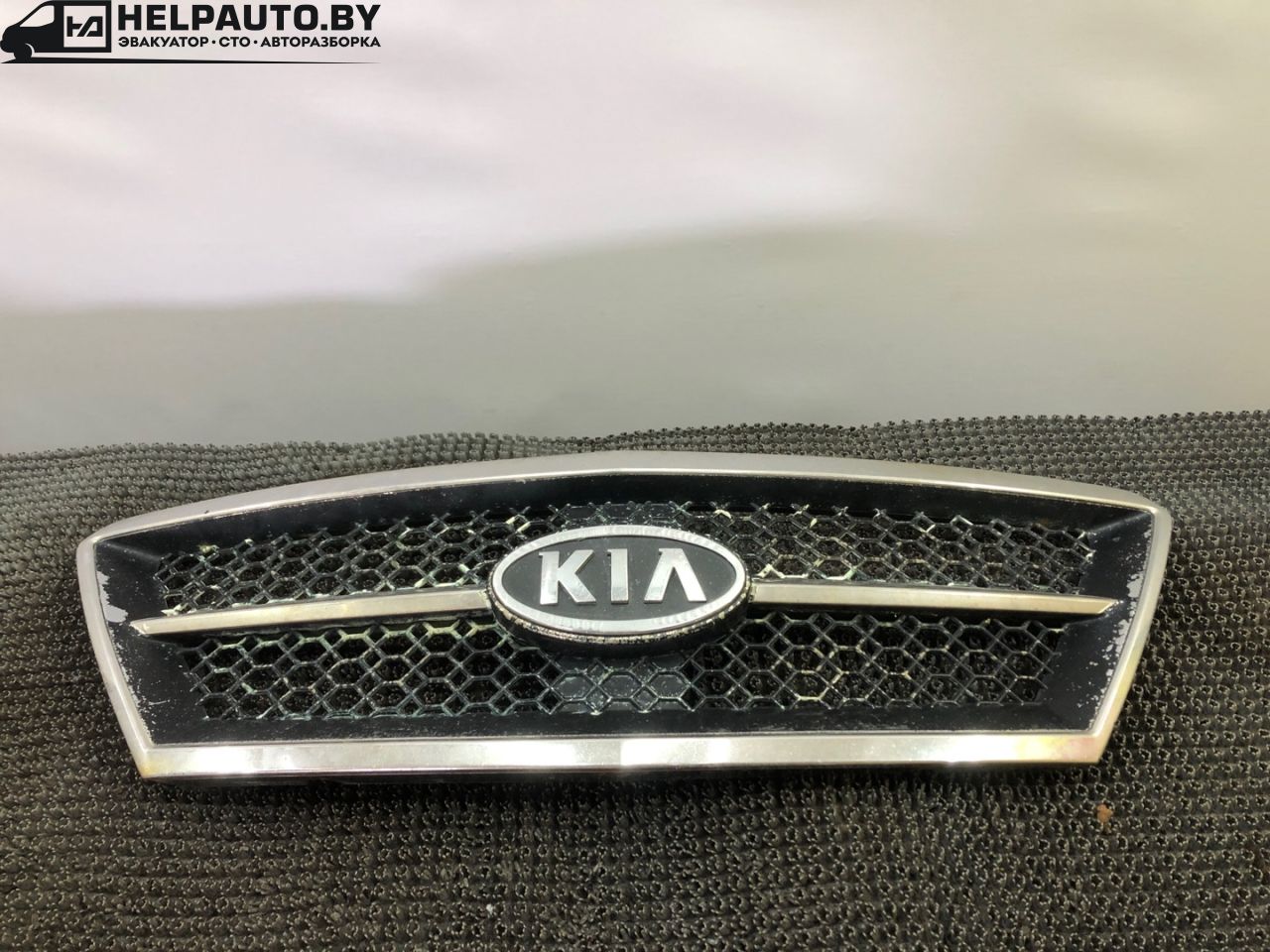 решетка радиатора Kia Sorento 1 поколение 2005, 2.4 л., G4JS, бензин, МКПП, красный, внедорожник 5 дв., полный подключаемый привод - фото №1
