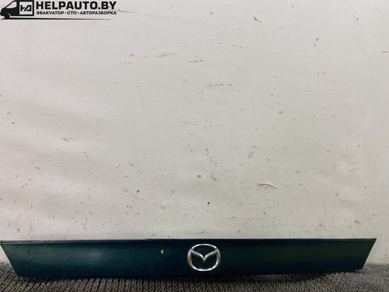 подсветка номера Mazda 626 GF 1997, 2.0 л., дизель, МКПП, зелёный, седан, передний привод - фото №1