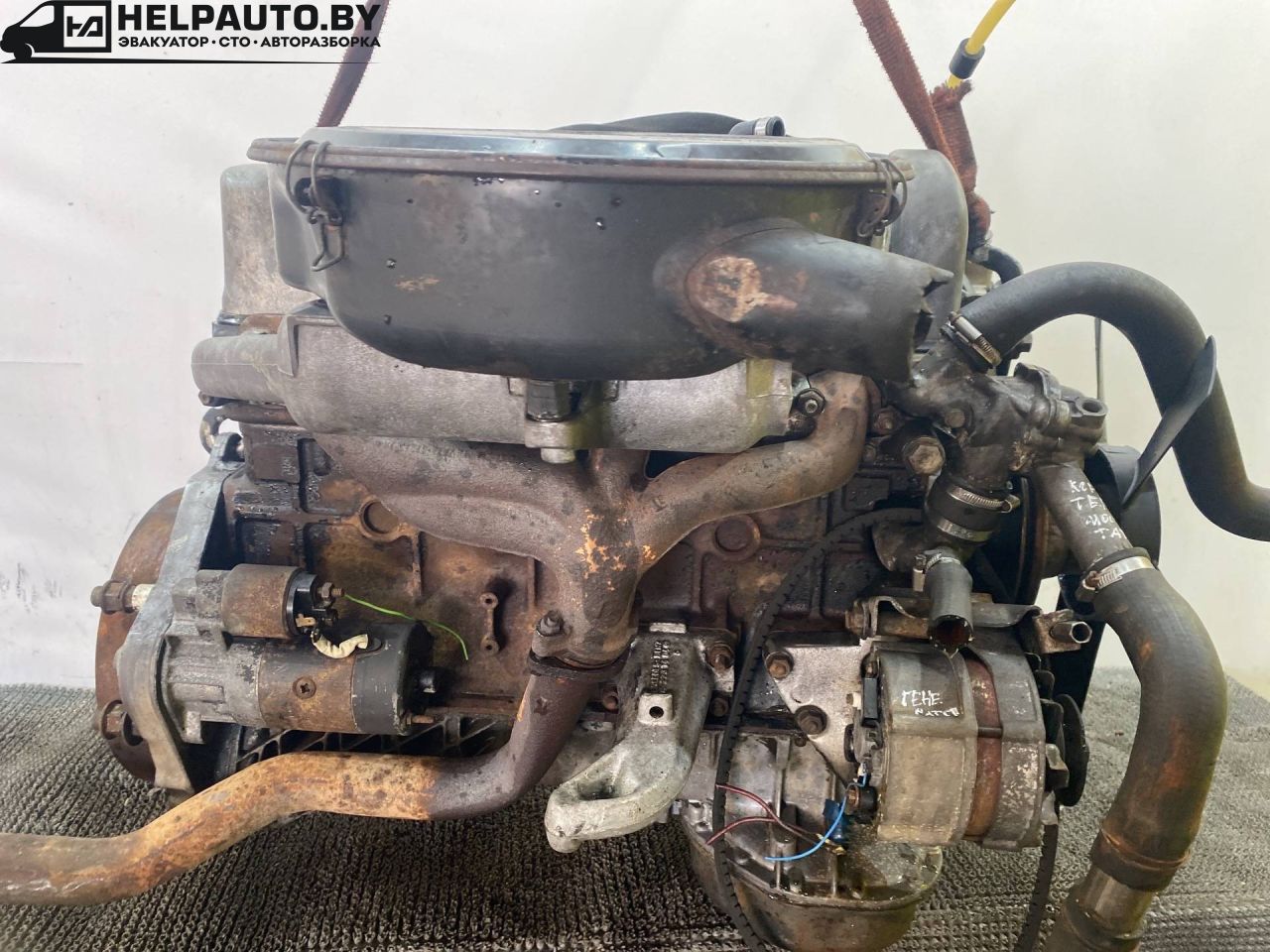 коллектор выпускной Mercedes-Benz W123 W123 1983, 3.0 л., дизель, МКПП, седан - фото №1