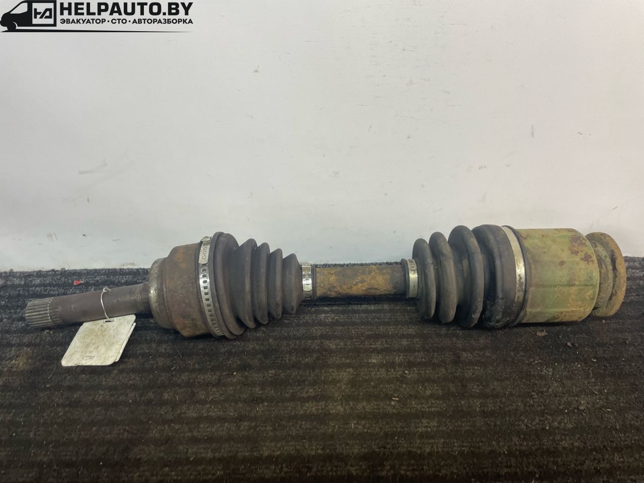 полуось передняя правая (приводной вал, ШРУС) Kia Sportage 1 поколение 2000, 2.0 л., FE (16V), бензин, МКПП, зеленый, полный подключаемый привод, правый руль - фото №1