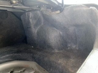 обшивка багажника Pontiac Sunfire 1 поколение 1999, 2.2 л., бензин, АКПП, черный, передний привод