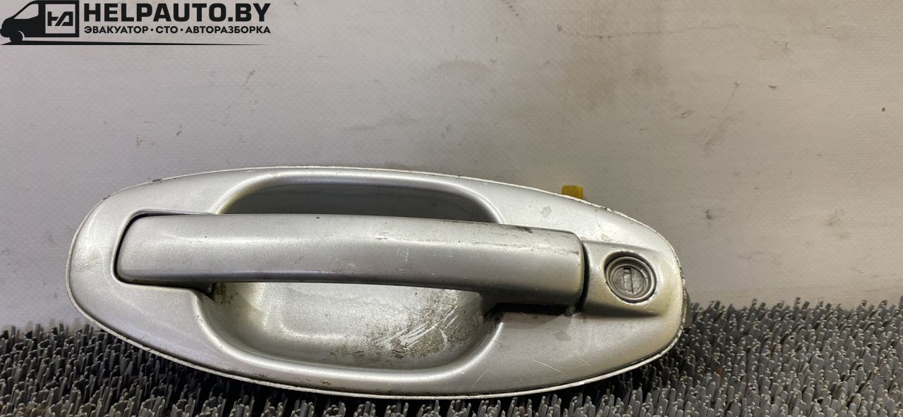 ручка наружная Hyundai Santa Fe 1 поколение (SM) 2003, 2.4 л., бензин, МКПП, серебристый, внедорожник 5 дв., передний привод, 82650-26000 - фото №1