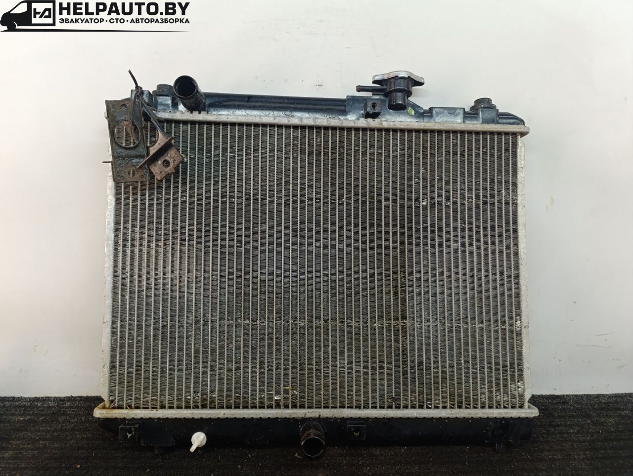 радиатор (основной) Suzuki Baleno 1 поколение 1998, 1.3 л., i, G13BB, бензин, МКПП, серебристый, седан, передний привод - фото №1