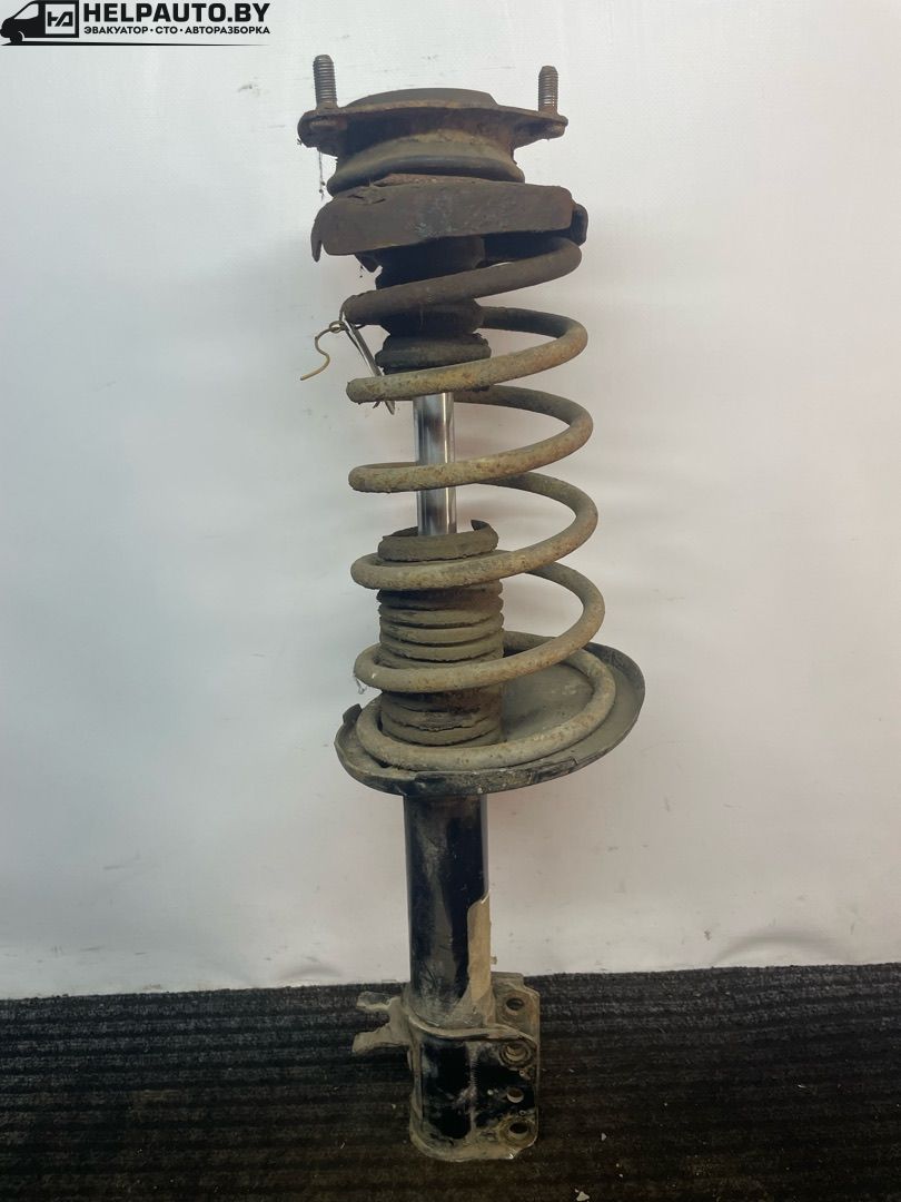 стойка задняя Mazda 626 3 поколение 1990, 2.0 л., i, бензин, МКПП, хетчбэк 5 дв., передний привод - фото №1