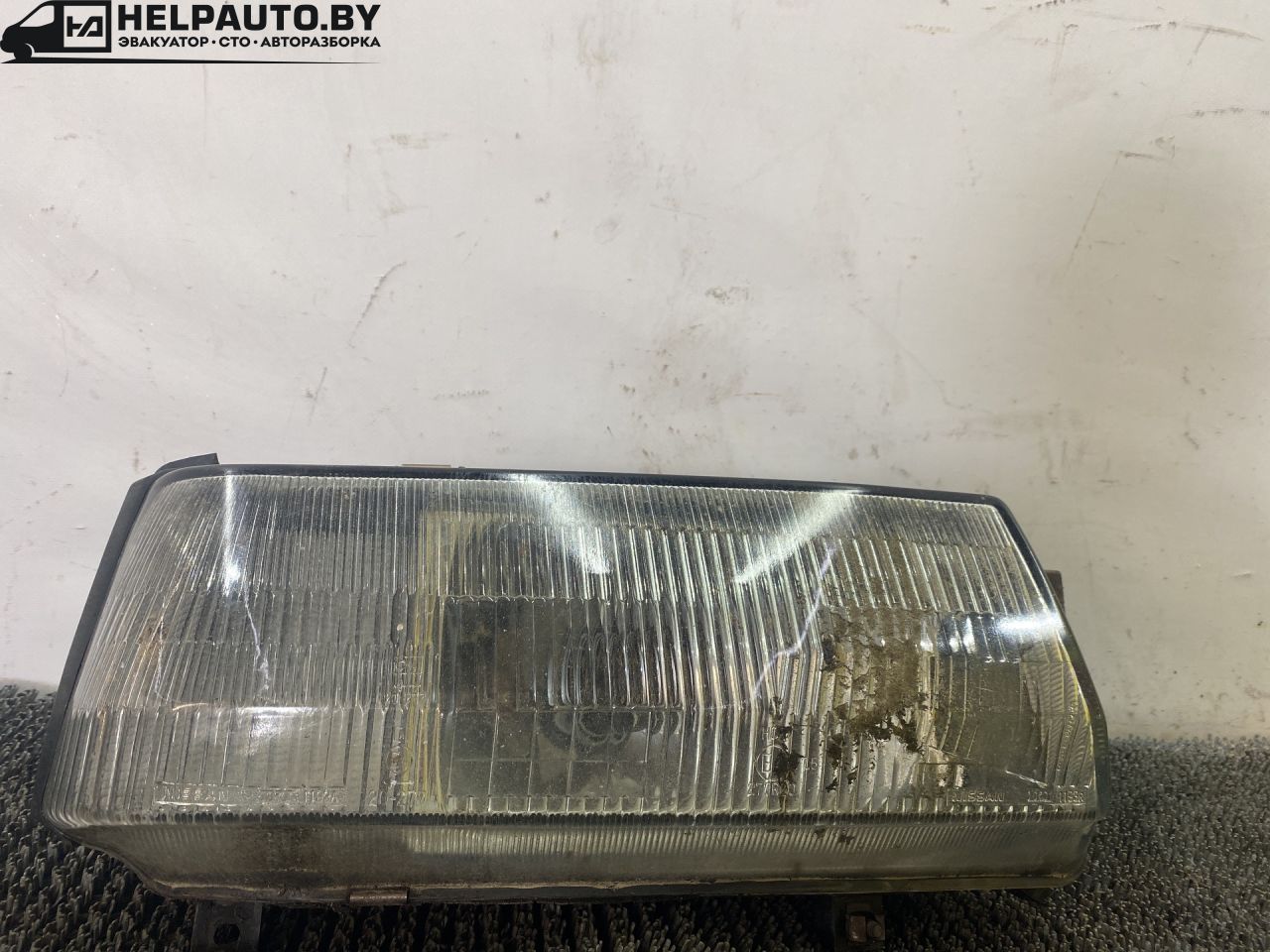 фара правая Nissan Bluebird T12/T72 1987, 2.0 л., бензин, МКПП, бордовый, хетчбэк 5 дв., передний привод - фото №1