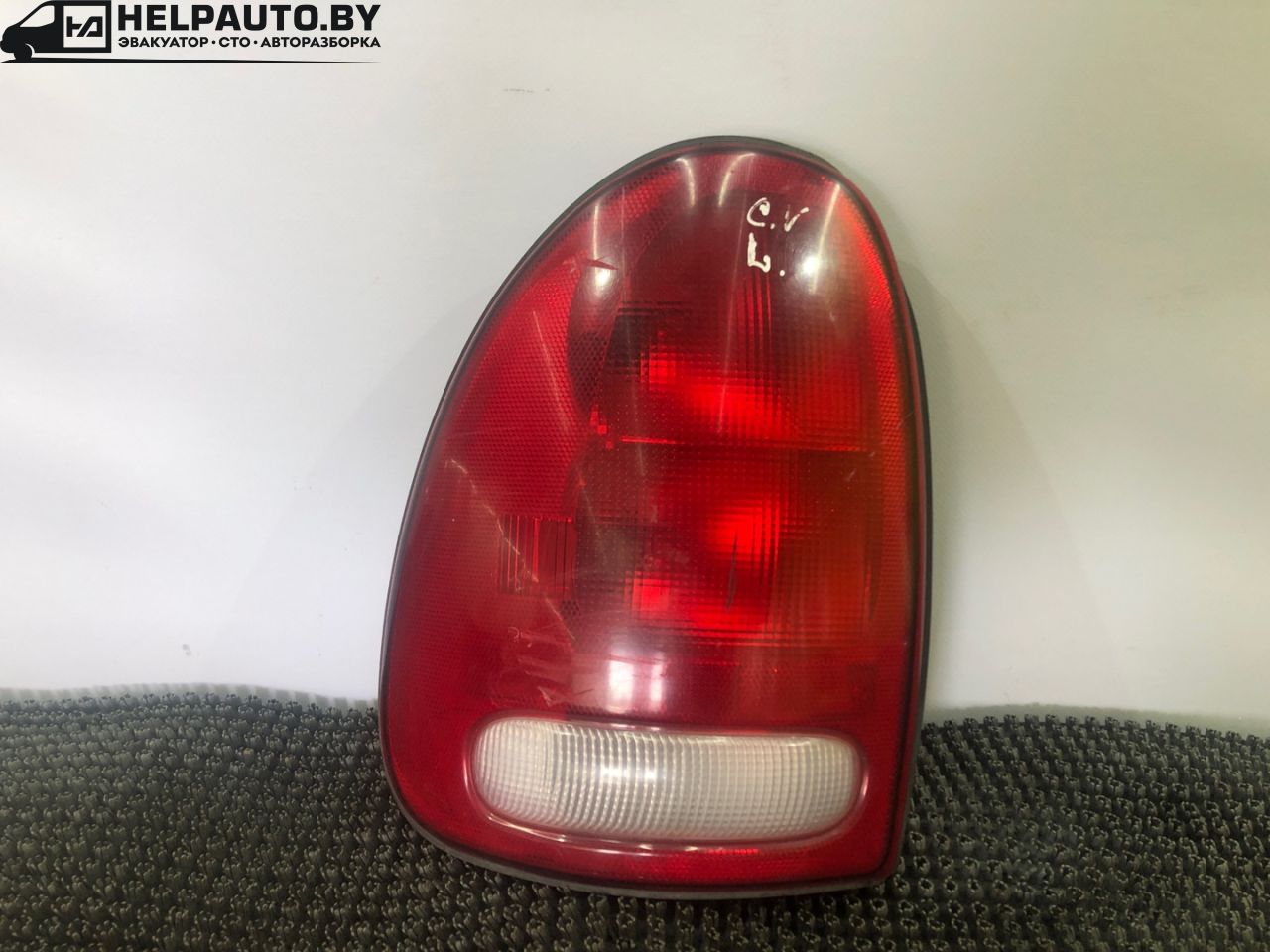 фонарь задний левый Dodge Caravan 3 поколение RG 1999, 2.4 л., EDZ, бензин, АКПП, темно зеленый, передний привод - фото №1