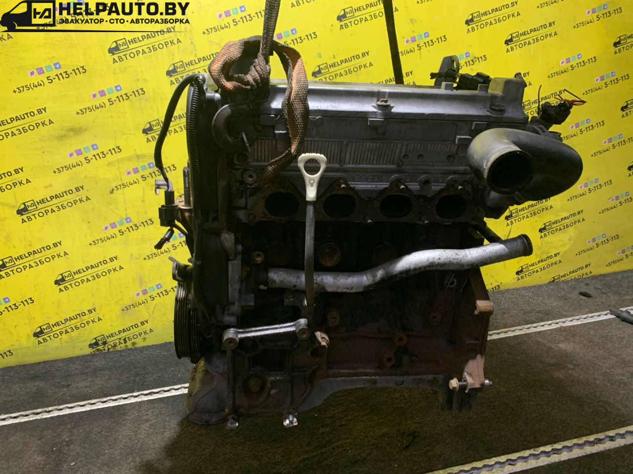 двигатель Mitsubishi Carisma 1 поколение (1995 - 1999), 1.8 л., 4G93 (GDI), бензин, МКПП, серебро, хетчбэк 5 дв., передний привод, 4G93, HS8530 - фото №1