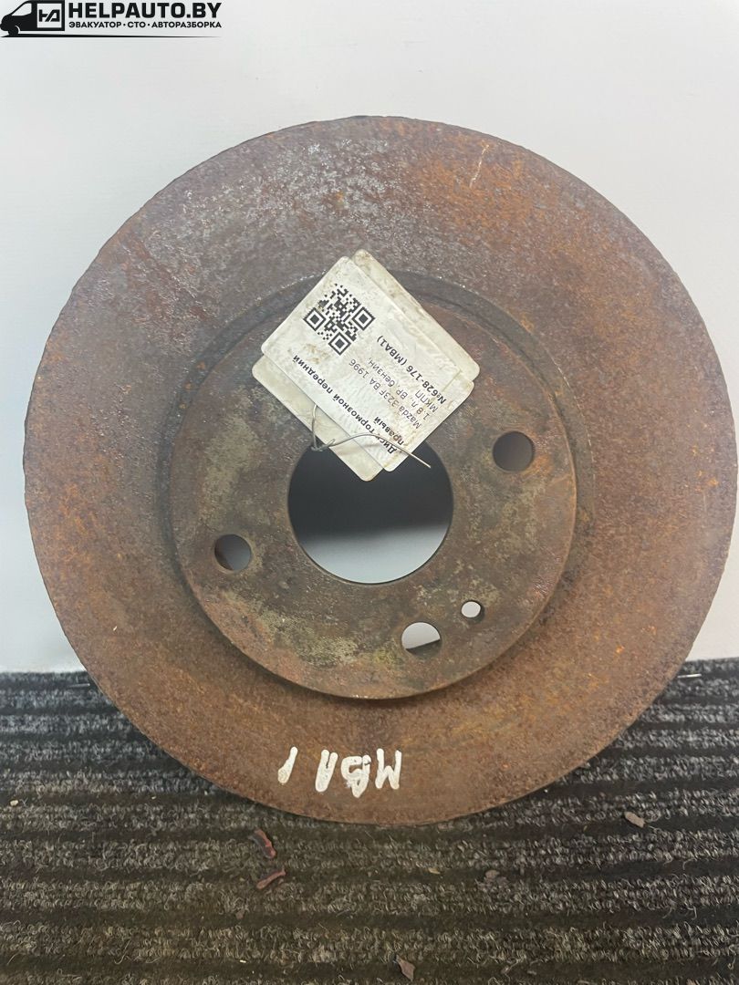 диск тормозной передний Mazda 323F BA 1996, 1.8 л., BP, бензин, МКПП, серебристый, хетчбэк 5 дв. - фото №1