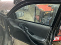 замок двери передней правой Pontiac Sunfire 1 поколение 1999, 2.2 л., бензин, АКПП, черный, передний привод - фото №2