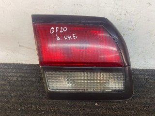 фонарь крышки багажника левый Mazda 626 GF 1997, 2.0 л., дизель, МКПП, зелёный, седан, передний привод