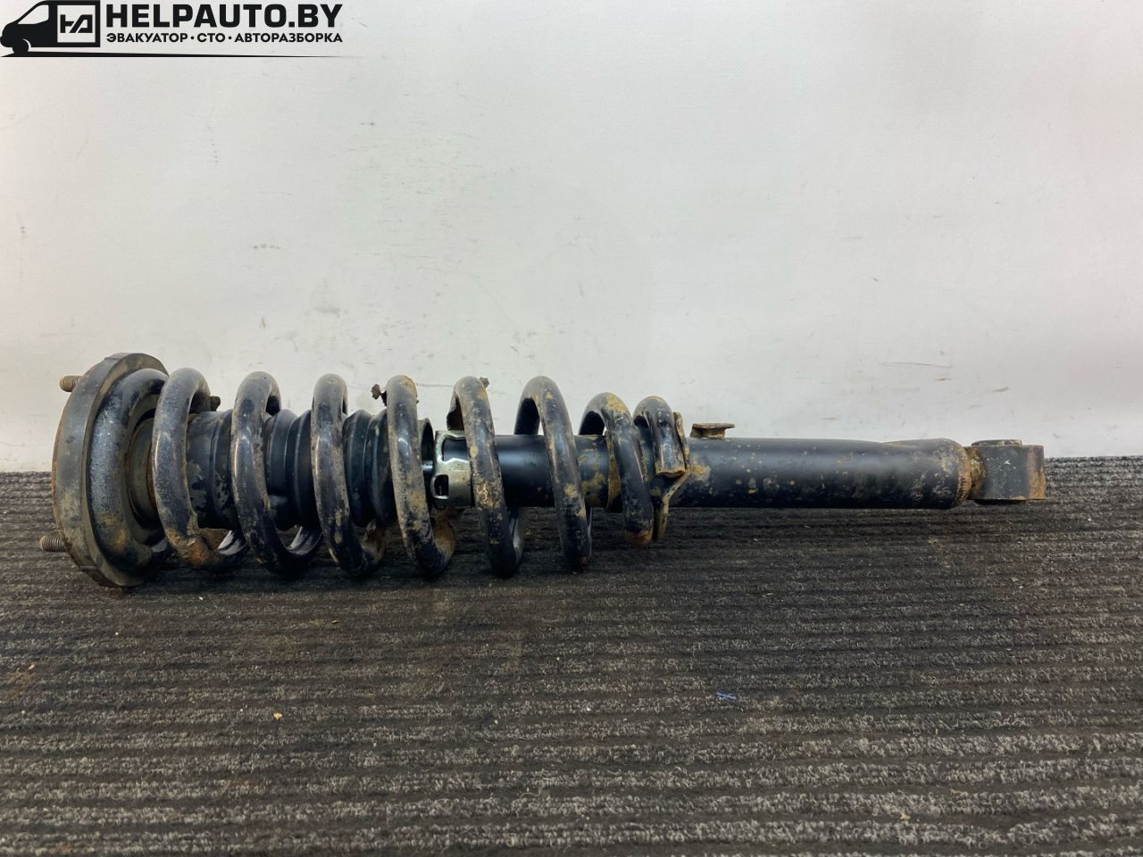 стойка передняя левая Kia Sorento 1 поколение 2005, 2.5 л., CRDi, D4CB, дизель, МКПП, черный, внедорожник 5 дв., полный подключаемый привод - фото №1