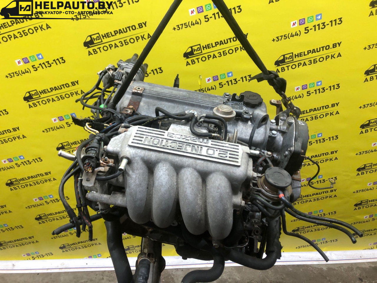 распределитель зажигания (трамблёр) Mazda 626 3 поколение GD (1987 - 1992), 2.0 л., бензин, МКПП, желтый, седан, передний привод - фото №1