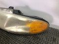 фара левая Dodge Caravan 3 поколение RG 1999, 2.4 л., EDZ, бензин, АКПП, темно зеленый, передний привод - фото №2