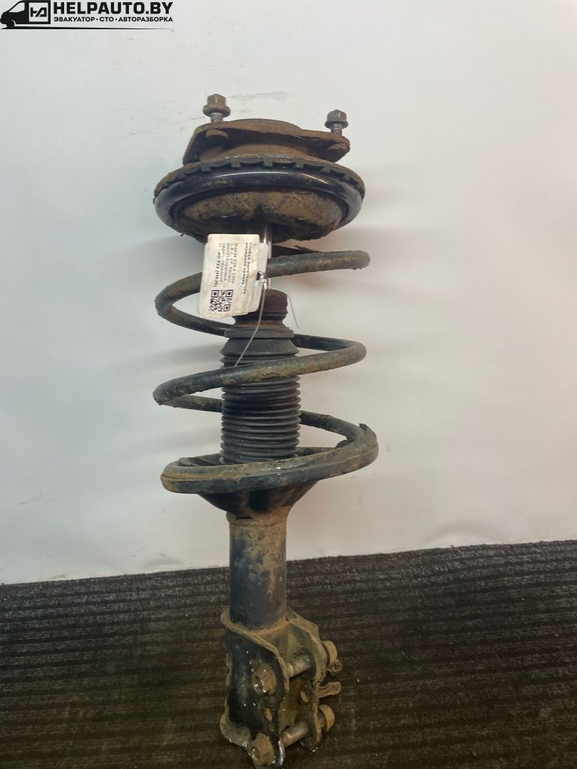 стойка передняя правая Mazda 626 GE 1994, 1.8 л., FP, бензин, МКПП, бордовый, седан, передний привод - фото №1