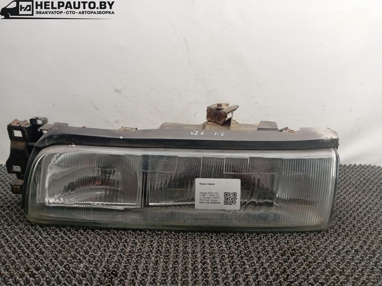фара левая Mazda 626 3 поколение GD (1987 - 1992), 2.0 л., бензин, МКПП, желтый, седан, передний привод - фото №1