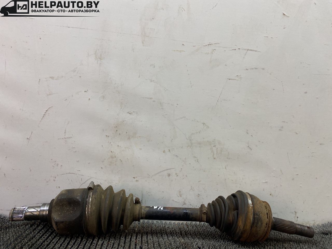 полуось передняя левая (приводной вал, ШРУС) Nissan Bluebird T12/T72 1987, 2.0 л., бензин, МКПП, бордовый, хетчбэк 5 дв., передний привод - фото №1