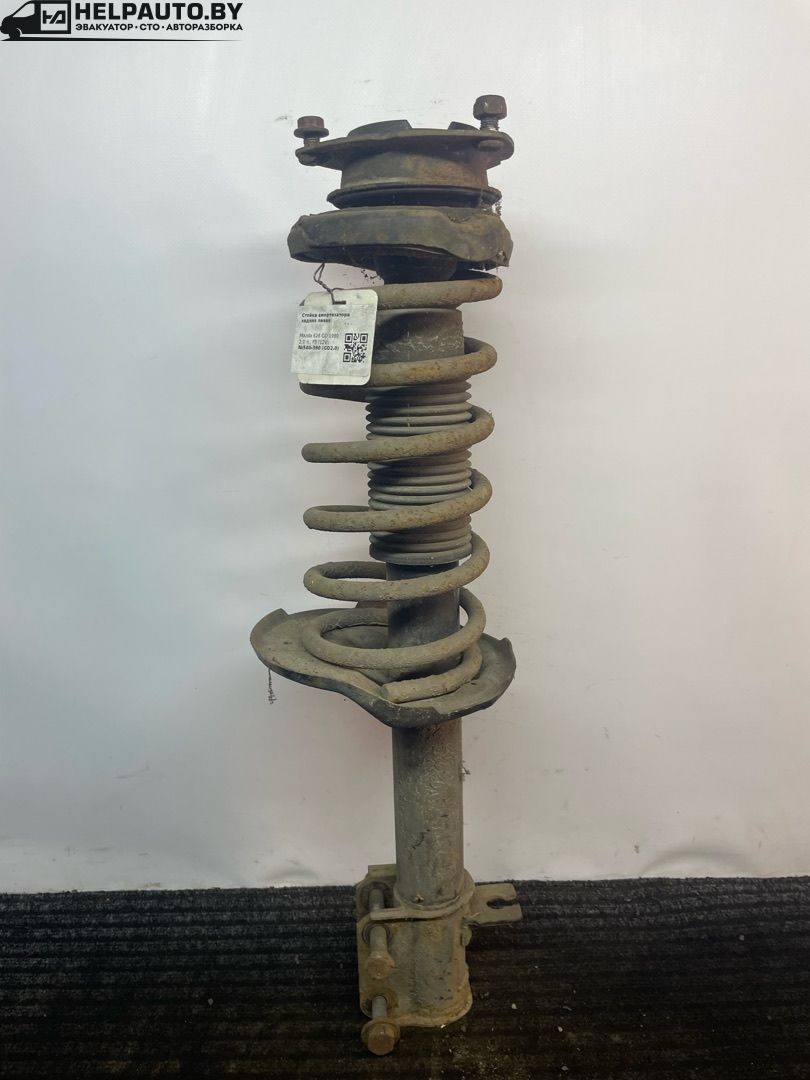 стойка задняя Mazda 626 3 поколение 1990, 2.0 л., F8 (12V), бензин, 5МКПП, серебристый, седан, передний привод - фото №1