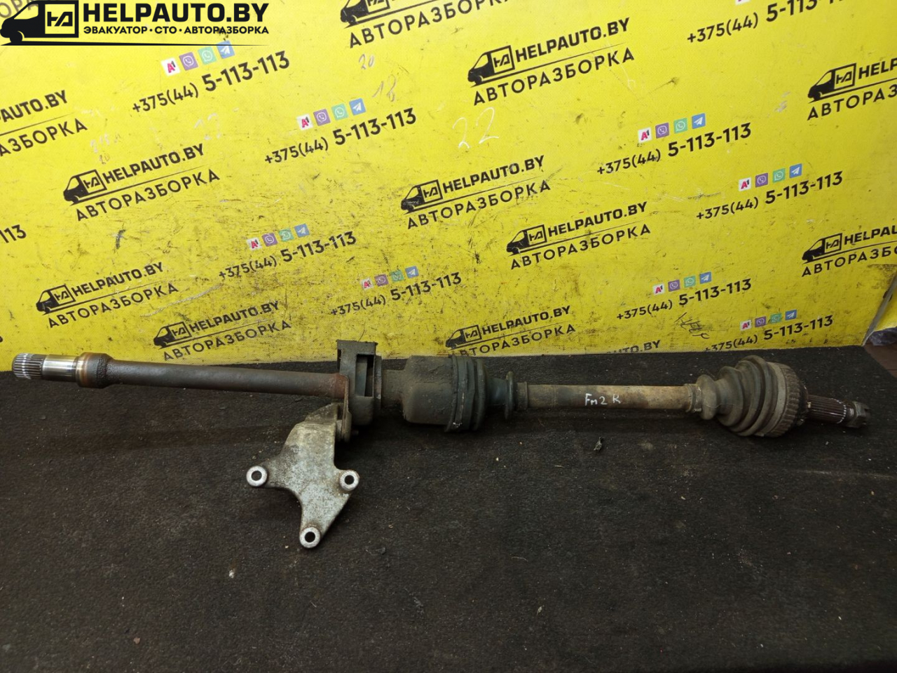 полуось передняя правая (приводной вал, ШРУС) Ford Mondeo 2 поколение 1997, 2.0 л., бензин, МКПП, черный, универсал, передний привод - фото №1