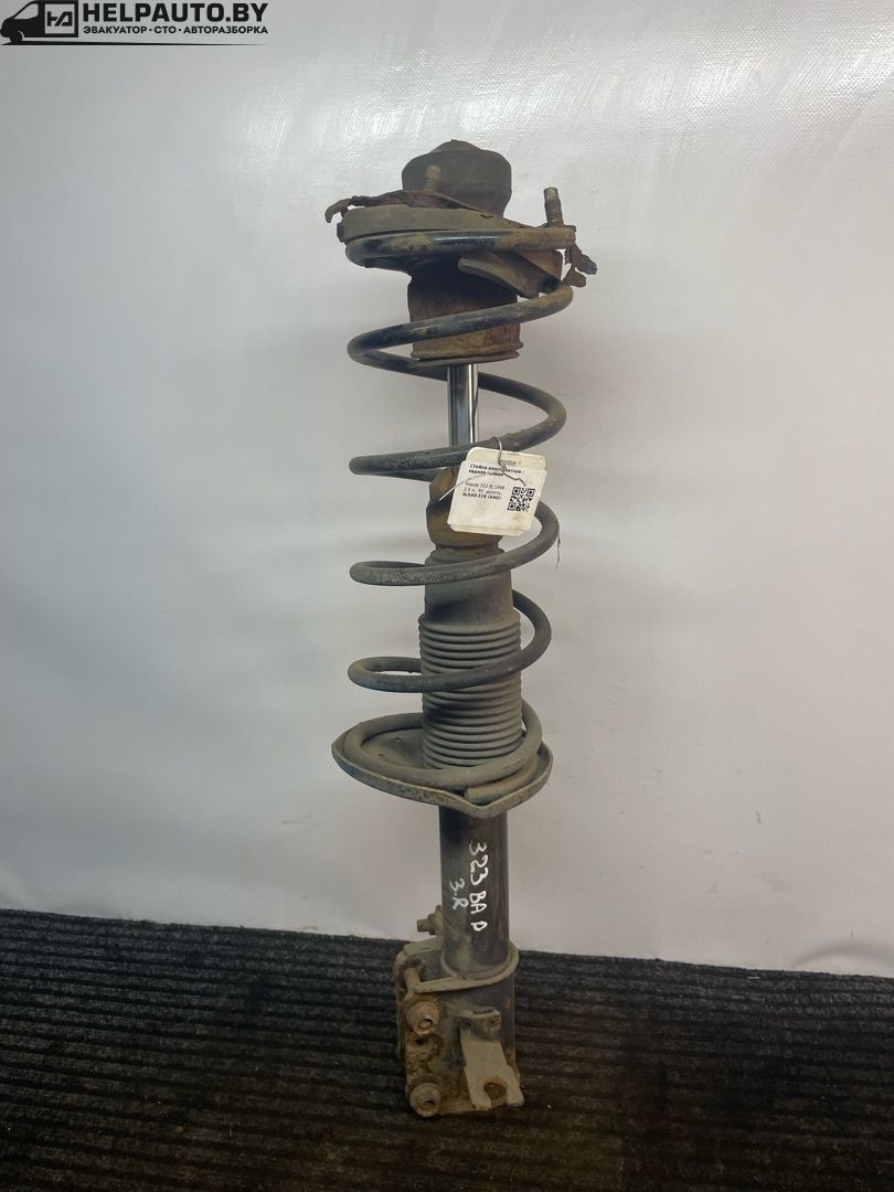 стойка задняя Mazda 323 6 поколение 1998, 2.0 л., дизель, МКПП, синий, хетчбэк 3 дв. - фото №1
